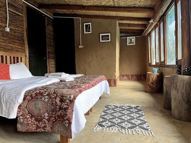 Imagen de la habitación del Hotel GlampInn Woods. Foto 9