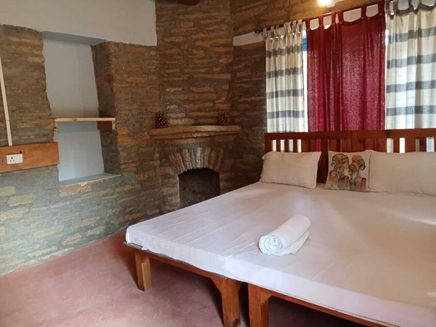 Imagen de la habitación del Hotel GlampInn Woods. Foto 15