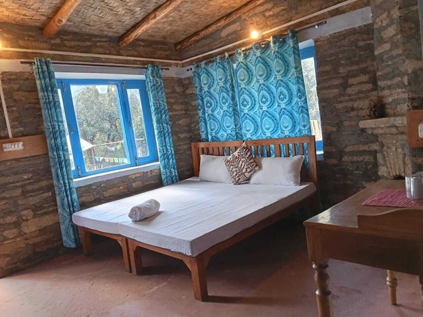 Imagen de la habitación del Hotel GlampInn Woods. Foto 16