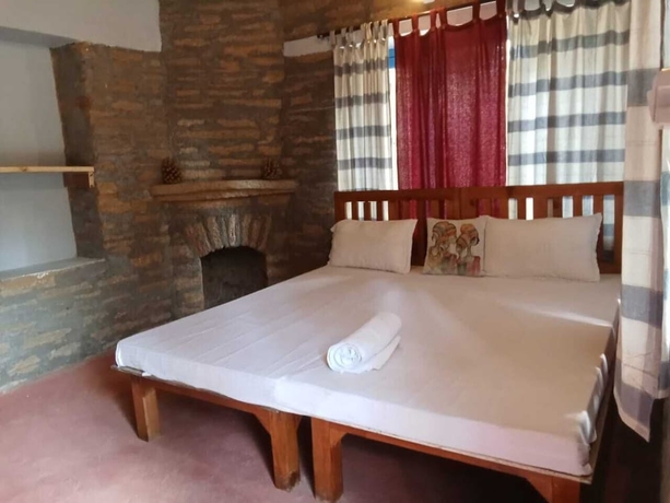 Imagen de la habitación del Hotel GlampInn Woods. Foto 17