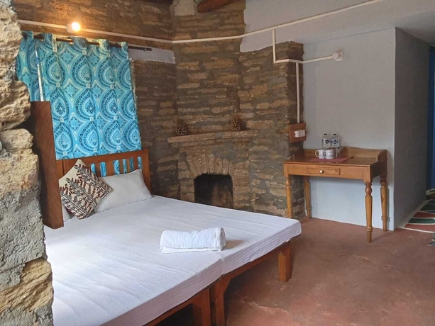 Imagen de la habitación del Hotel GlampInn Woods. Foto 18
