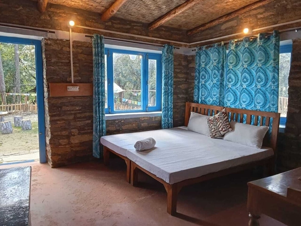 Imagen de la habitación del Hotel GlampInn Woods. Foto 19