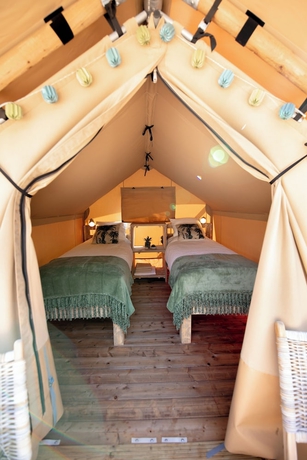 Imagen de la habitación del Hotel Glamping Can Bora Lodges. Foto 7