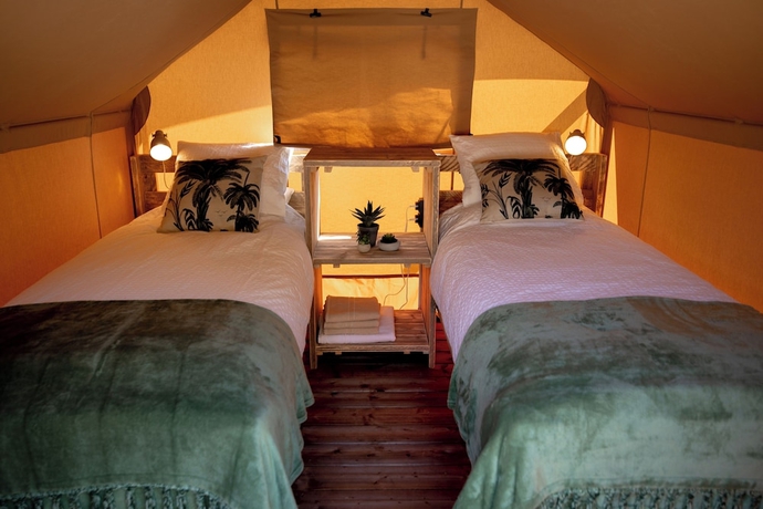 Imagen de la habitación del Hotel Glamping Can Bora Lodges. Foto 8