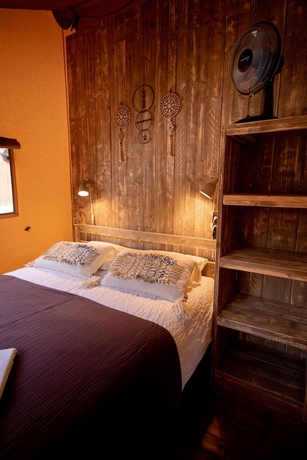 Imagen de la habitación del Hotel Glamping Can Bora Lodges. Foto 11