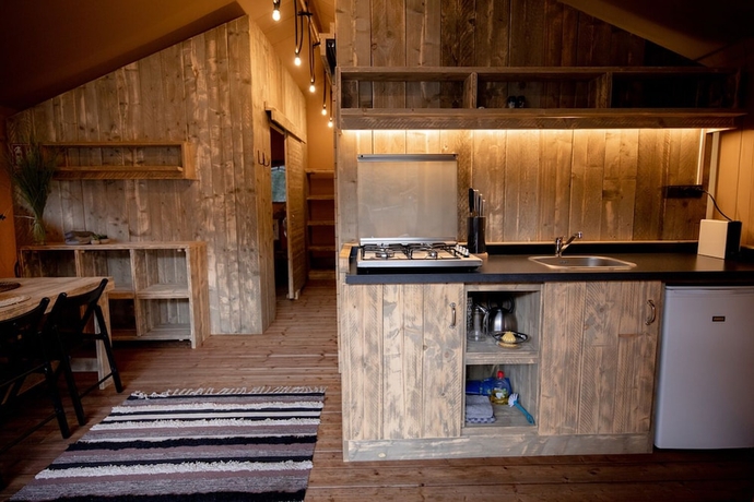 Imagen de la habitación del Hotel Glamping Can Bora Lodges. Foto 13