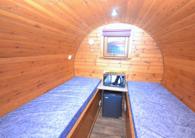 Imagen de la habitación del Hotel Glamping Pods. Foto 10