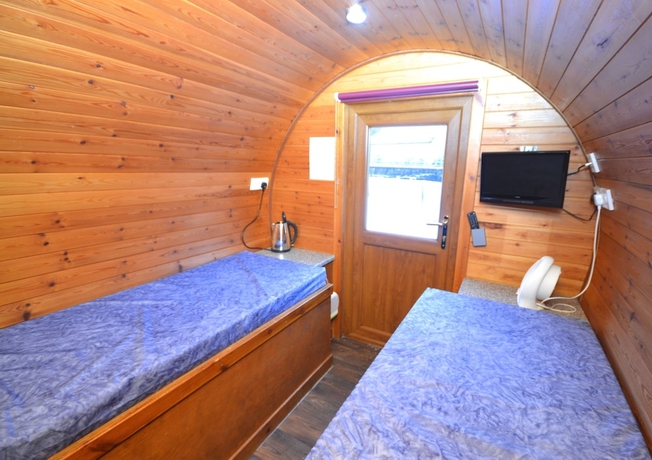 Imagen de la habitación del Hotel Glamping Pods. Foto 12