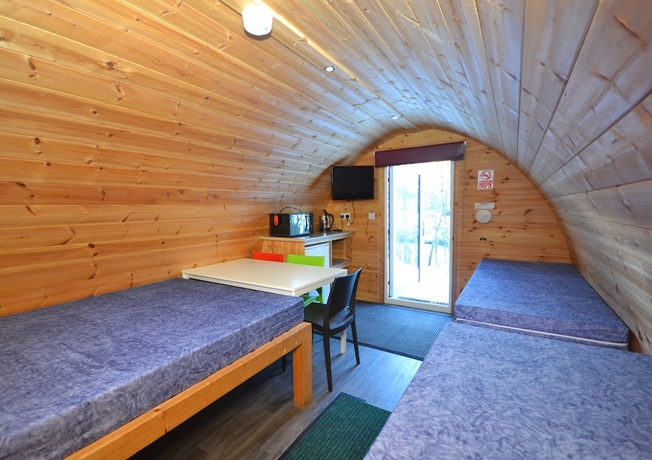 Imagen de la habitación del Hotel Glamping Pods. Foto 14