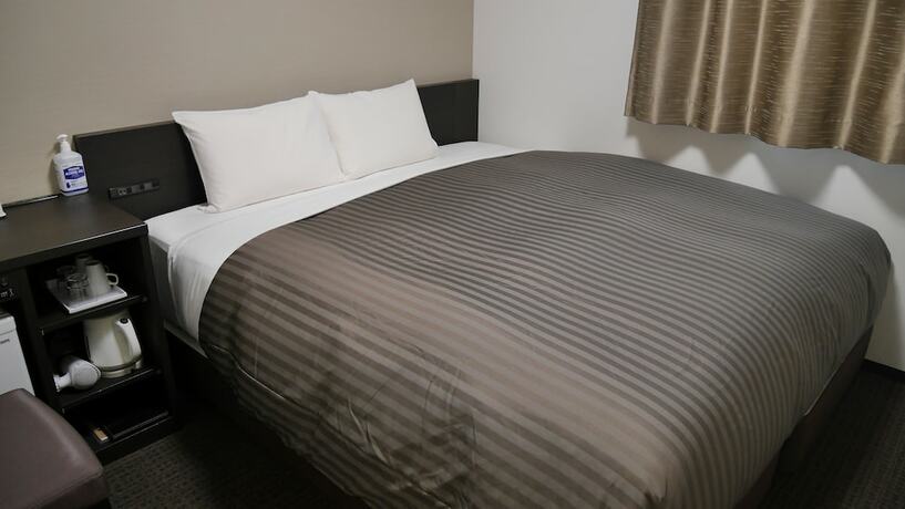 Imagen de la habitación del Hotel Glanys Koshigaya. Foto 10