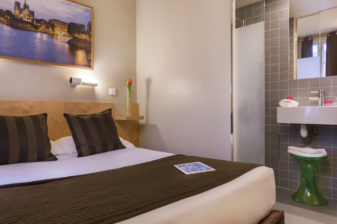 Imagen de la habitación del Hotel Glasgow Monceau Paris By Patrick Hayat. Foto 9