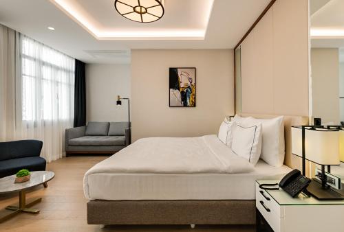 Imagen de la habitación del Hotel Gleam Collection. Foto 17