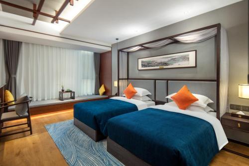 Imagen de la habitación del Hotel Glean Xinzhou. Foto 17