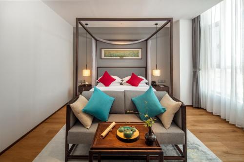 Imagen de la habitación del Hotel Glean Xinzhou. Foto 18