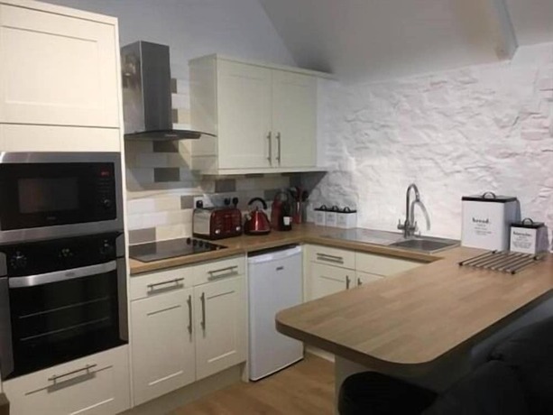 Imagen de la habitación del Hotel Glebe House Cottages. Foto 11