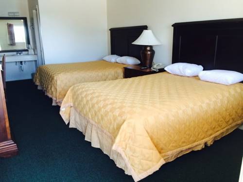 Imagen de la habitación del Hotel Glen Rose Inn And Suites. Foto 2