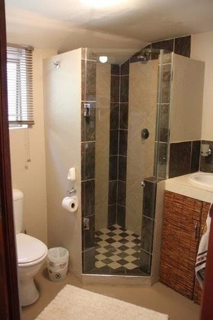 Imagen de la habitación del Hotel Glenda S Guest Suites. Foto 9