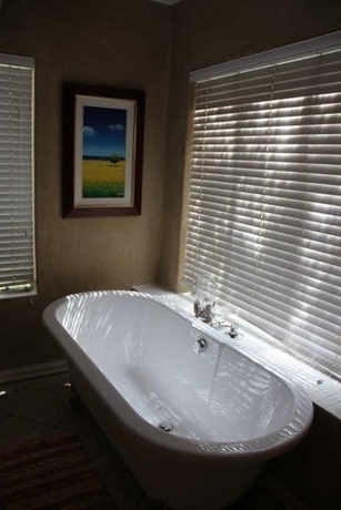 Imagen de la habitación del Hotel Glenda S Guest Suites. Foto 11