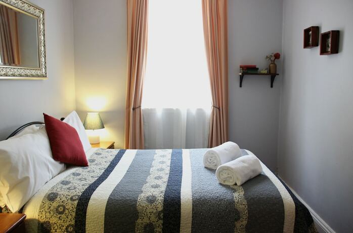 Imagen de la habitación del Hotel Glenella Guesthouse. Foto 5