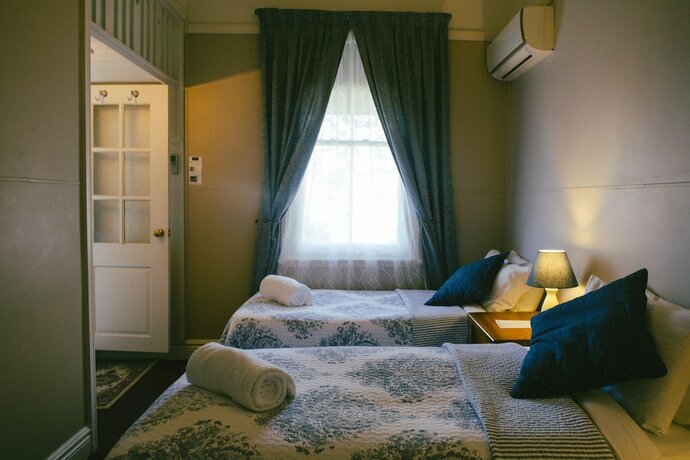 Imagen de la habitación del Hotel Glenella Guesthouse. Foto 8