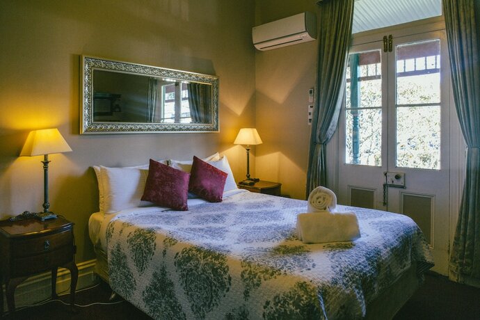 Imagen de la habitación del Hotel Glenella Guesthouse. Foto 11