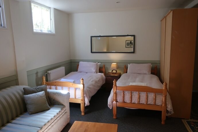 Imagen de la habitación del Hotel Glenella Guesthouse. Foto 13