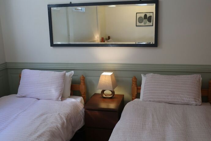 Imagen de la habitación del Hotel Glenella Guesthouse. Foto 14