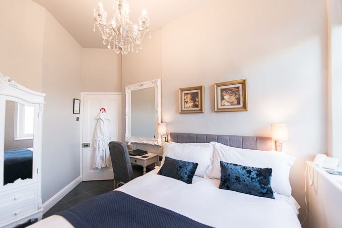 Imagen de la habitación del Hotel Glewstone Court Country House. Foto 7
