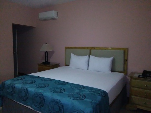 Imagen de la habitación del Hotel Glistening Waters. Foto 15