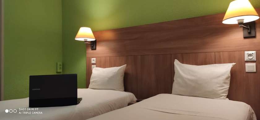 Imagen de la habitación del Hotel Glisy. Foto 16