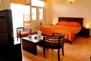 Imagen de la habitación del Hotel Glitz, JAIPUR. Foto 4