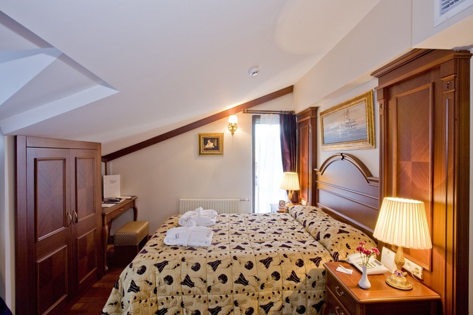 Imagen de la habitación del Hotel Glk Premier Regency Suites and Spa. Foto 9