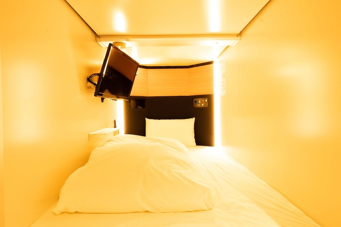 Imagen de la habitación del Hotel Global Cabin Yokohama Chukagai. Foto 6