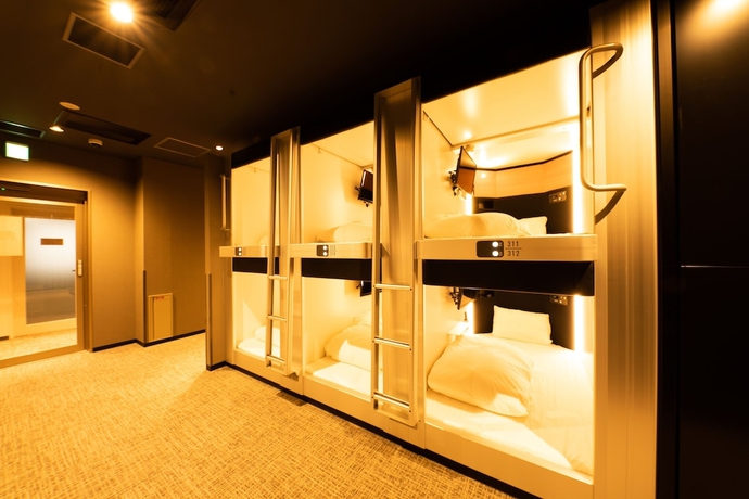 Imagen de la habitación del Hotel Global Cabin Yokohama Chukagai. Foto 9