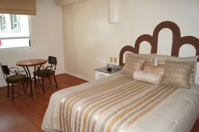 Imagen de la habitación del Hotel Global Express Puebla. Foto 3