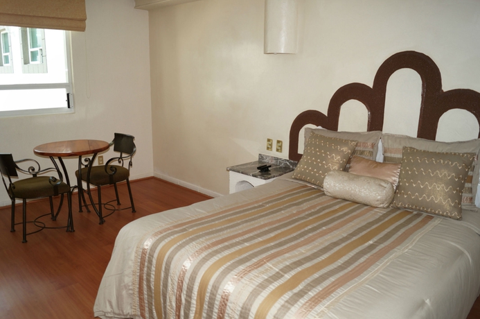 Imagen de la habitación del Hotel Global Express Puebla. Foto 7