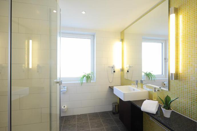 Imagen de la habitación del Hotel Global Inn. Foto 5