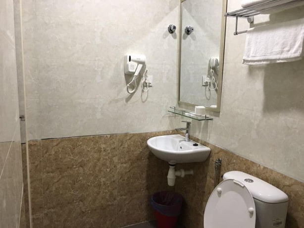 Imagen de la habitación del Hotel Global Inn. Foto 3