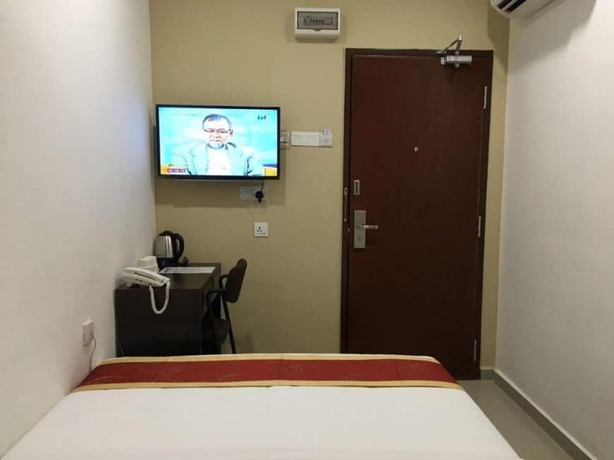 Imagen de la habitación del Hotel Global Inn. Foto 4