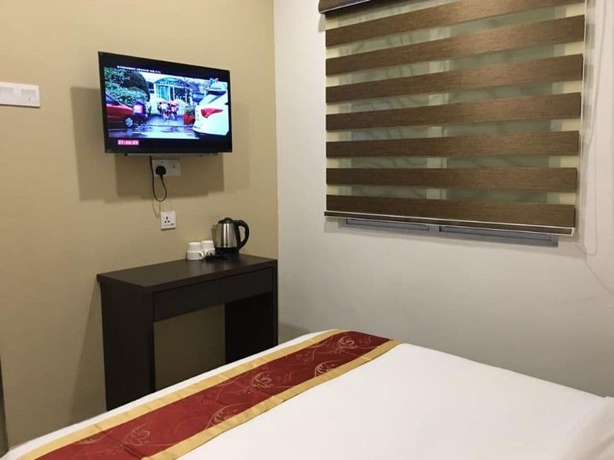 Imagen de la habitación del Hotel Global Inn. Foto 7