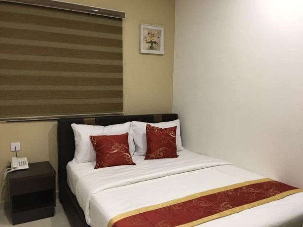 Imagen de la habitación del Hotel Global Inn. Foto 9