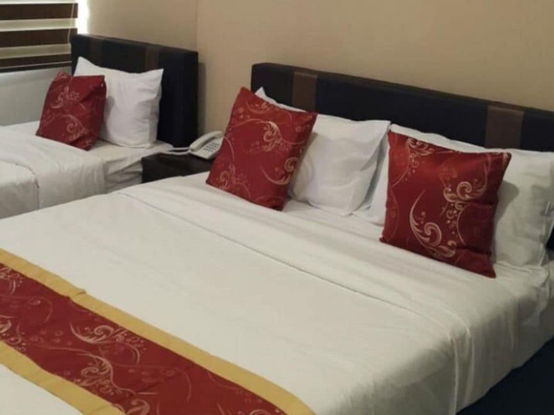 Imagen de la habitación del Hotel Global Inn. Foto 10