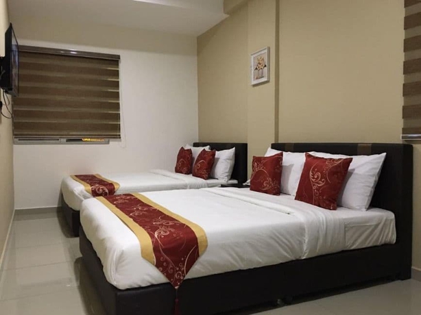 Imagen de la habitación del Hotel Global Inn. Foto 13