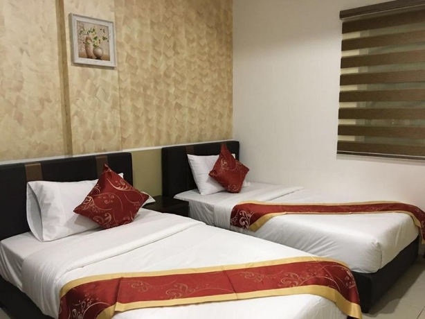 Imagen de la habitación del Hotel Global Inn. Foto 14