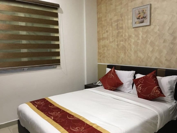 Imagen de la habitación del Hotel Global Inn. Foto 15