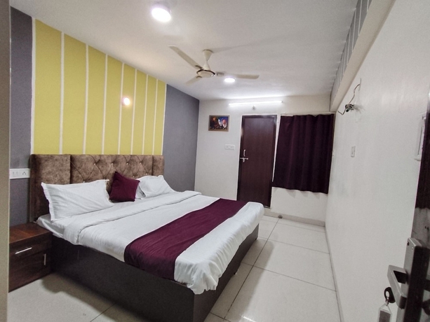Imagen de la habitación del Hotel Global Inn, Indore. Foto 3