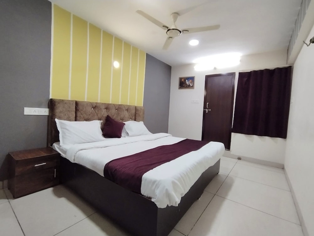 Imagen de la habitación del Hotel Global Inn, Indore. Foto 4