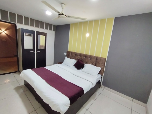Imagen de la habitación del Hotel Global Inn, Indore. Foto 5