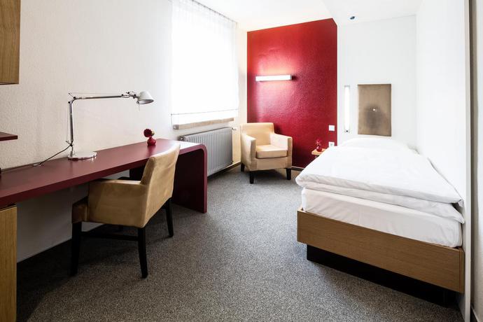 Imagen de la habitación del Hotel Global Inn, Wolfsburg. Foto 9