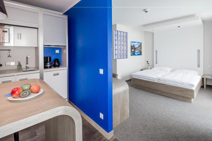 Imagen de la habitación del Hotel Global Inn, Wolfsburg. Foto 10